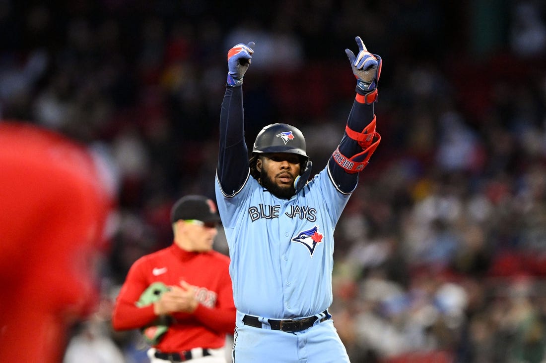 May 4, 2023; Boston, Massachusetts, USA; Toronto Blue Jays first baseman Vladimir Guerrero Jr. (27) reacts after hitting a RBI double against the Boston Red Sox during the fifth inning at Fenway Park. Mandatory Credit: Brian Fluharty-USA TODAY Sports