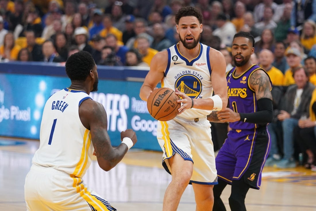 May 4, 2023; San Francisco, California, USA; Golden State Warriors guard Klay Thompson (11) holds onto a rebound against the Los Angeles Lakers in the first quarter during game two of the 2023 NBA playoffs at the Chase Center. Mandatory Credit: Cary Edmondson-USA TODAY Sports