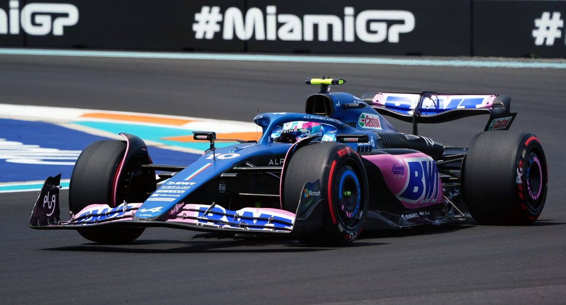 May 5, 2023; Miami Gardens, Florida, USA;  Alpine driver Pierre Gasly (10) of France races out of turn one during the first practice at Miami International Autodrome. Mandatory Credit: John David Mercer-USA TODAY Sports