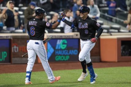 May 5, 2023; New York City, New York, USA; New York Mets center fielder Brandon Nimmo (9) celebrates his solo home run with right fielder Starling Marte (6) during the fourth inning against Colorado Rockies at Citi Field. Mandatory Credit: Vincent Carchietta-USA TODAY Sports