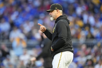 May 5, 2023; Pittsburgh, Pennsylvania, USA; Pittsburgh Pirates manager Derek Shelton (17) signals for a pitching change during the sixth inning against the Toronto Blue Jays at PNC Park. Mandatory Credit: Gregory Fisher-USA TODAY Sports