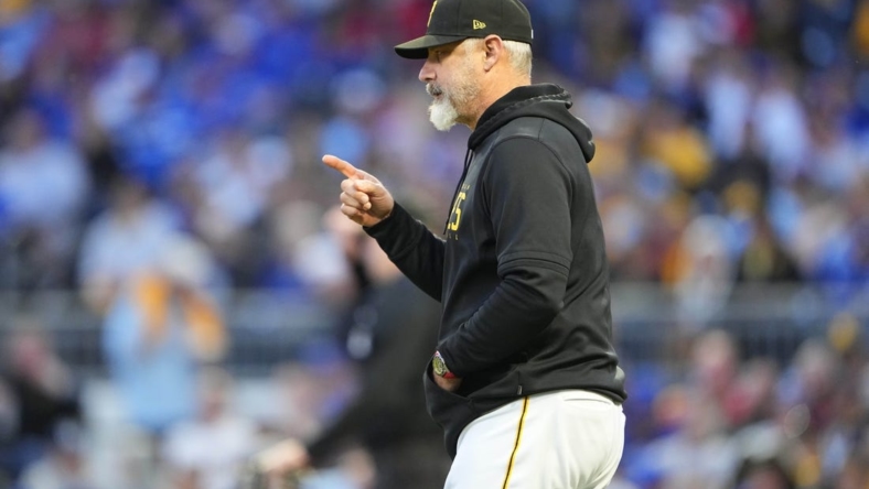 May 5, 2023; Pittsburgh, Pennsylvania, USA; Pittsburgh Pirates manager Derek Shelton (17) signals for a pitching change during the sixth inning against the Toronto Blue Jays at PNC Park. Mandatory Credit: Gregory Fisher-USA TODAY Sports