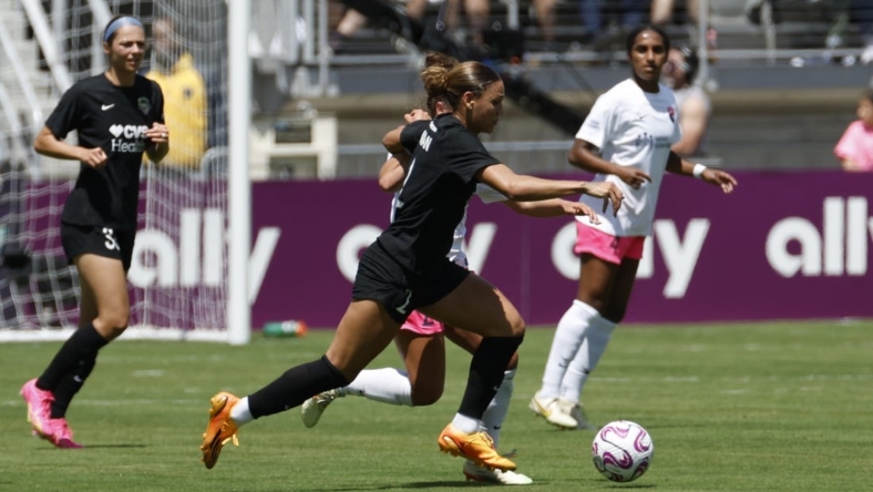 May 6, 2023; Washington, DC, USA; Washington Spirit forward Trinity Rodman (2) is defended by San Diego Wave FC midfielder Danielle Colaprico (24) in a NWSL game at Audi Field. Mandatory Credit: Geoff Burke-USA TODAY Sports