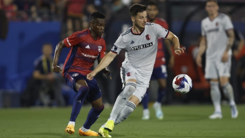 May 6, 2023; Frisco, Texas, USA; St. Louis City forward Tomas Ostrak (7) controls the ball against FC Dallas forward Jader Obrian (8) during the first half at Toyota Stadium. Mandatory Credit: Tim Heitman-USA TODAY Sports