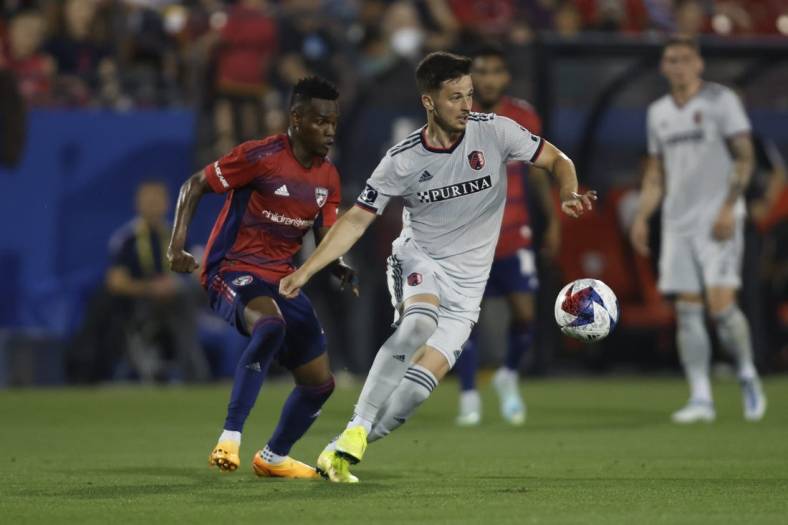 May 6, 2023; Frisco, Texas, USA; St. Louis City forward Tomas Ostrak (7) controls the ball against FC Dallas forward Jader Obrian (8) during the first half at Toyota Stadium. Mandatory Credit: Tim Heitman-USA TODAY Sports