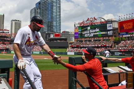 May 7, 2023; St. Louis, Missouri, USA;  St. Louis Cardinals first baseman Paul Goldschmidt (46) is congratulated by manager Oliver Marmol (37) after hitting a solo home run against the Detroit Tigers during the third inning at Busch Stadium. Mandatory Credit: Jeff Curry-USA TODAY Sports