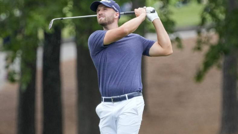 May 7, 2023; Charlotte, North Carolina, USA; Wyndham Clark hits his approach shot on five during the final round of the Wells Fargo Championship golf tournament. Mandatory Credit: Jim Dedmon-USA TODAY Sports