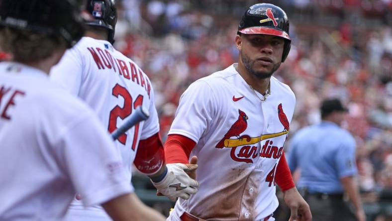 May 7, 2023; St. Louis, Missouri, USA;  St. Louis Cardinals designated hitter Willson Contreras (40) is congratulated by right fielder Lars Nootbaar (21) after scoring against the Detroit Tigers during the second inning at Busch Stadium. Mandatory Credit: Jeff Curry-USA TODAY Sports