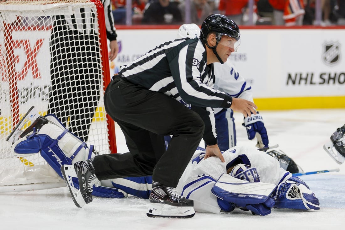 May 7, 2023; Sunrise, Florida, USA; Linesman Jonny Murray (95) checks on Toronto Maple Leafs goaltender Ilya Samsonov (35) after a collision during the second period against the Florida Panthers in game three of the second round of the 2023 Stanley Cup Playoffs at FLA Live Arena. Mandatory Credit: Sam Navarro-USA TODAY Sports