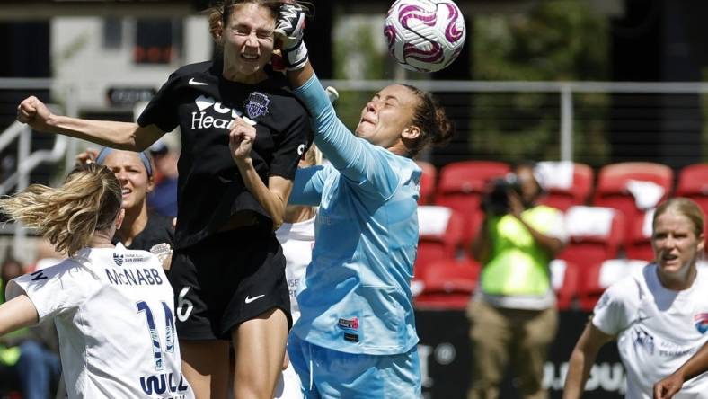 May 6, 2023; Washington, District of Columbia, USA; Washington Spirit midfielder Paige Metayer (26)  scores a goal on San Diego Wave FC goalkeeper Kailen Sheridan (1) at Audi Field. Mandatory Credit: Geoff Burke-USA TODAY Sports