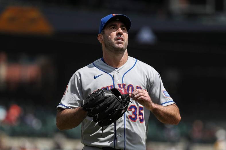 Mets pitcher Justin Verlander walks off the field after pitching against the Tigers during the third inning at Comerica Park on Thursday, May 4, 2023.