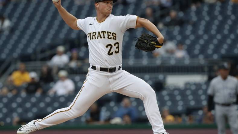 May 8, 2023; Pittsburgh, Pennsylvania, USA;  Pittsburgh Pirates starting pitcher Mitch Keller (23) delivers a pitch against the Colorado Rockies during the first inning at PNC Park. Mandatory Credit: Charles LeClaire-USA TODAY Sports