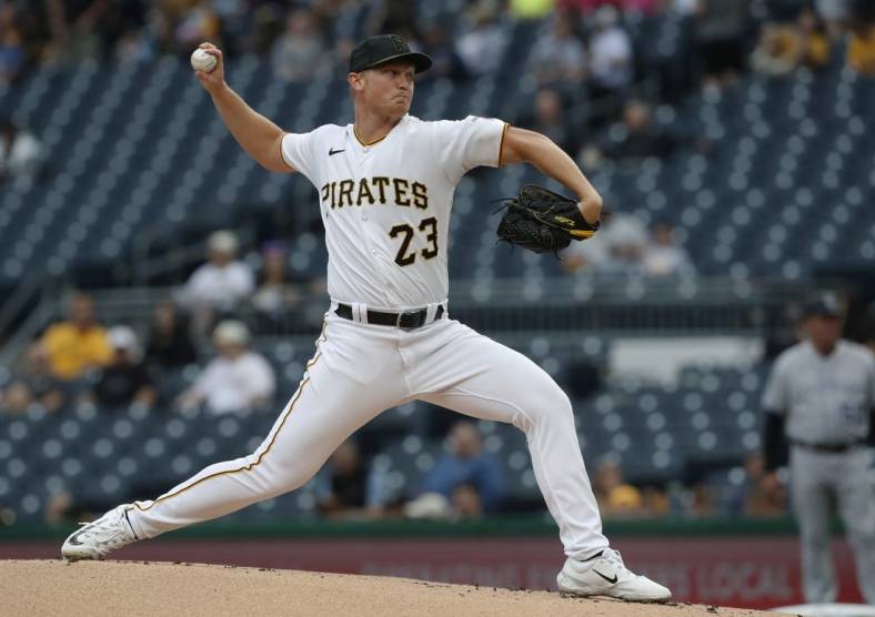 May 8, 2023; Pittsburgh, Pennsylvania, USA;  Pittsburgh Pirates starting pitcher Mitch Keller (23) delivers a pitch against the Colorado Rockies during the first inning at PNC Park. Mandatory Credit: Charles LeClaire-USA TODAY Sports