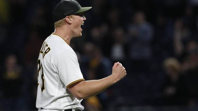 May 8, 2023; Pittsburgh, Pennsylvania, USA;  Pittsburgh Pirates starting pitcher Mitch Keller (23) reacts after pitching a complete game four hit shutout against the Colorado Rockies at PNC Park. The Pirates shutout the Rockies 2-0. Mandatory Credit: Charles LeClaire-USA TODAY Sports