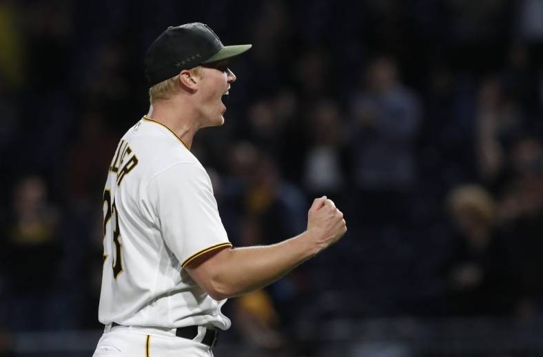 May 8, 2023; Pittsburgh, Pennsylvania, USA;  Pittsburgh Pirates starting pitcher Mitch Keller (23) reacts after pitching a complete game four hit shutout against the Colorado Rockies at PNC Park. The Pirates shutout the Rockies 2-0. Mandatory Credit: Charles LeClaire-USA TODAY Sports
