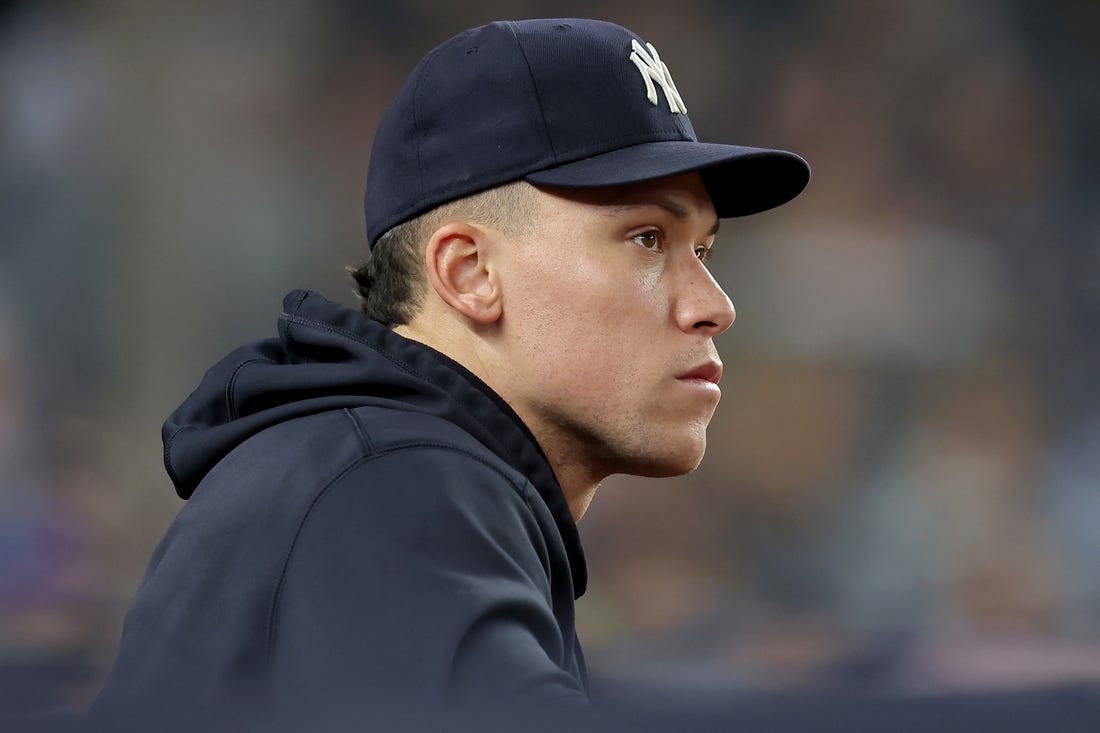 May 8, 2023; Bronx, New York, USA; New York Yankees injured outfielder Aaron Judge (99) watches from the dugout during the seventh inning against the Oakland Athletics at Yankee Stadium. Mandatory Credit: Brad Penner-USA TODAY Sports