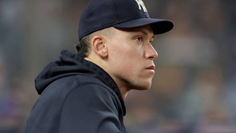 May 8, 2023; Bronx, New York, USA; New York Yankees injured outfielder Aaron Judge (99) watches from the dugout during the seventh inning against the Oakland Athletics at Yankee Stadium. Mandatory Credit: Brad Penner-USA TODAY Sports