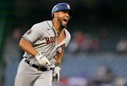 May 8, 2023; Anaheim, California, USA;  Houston Astros first baseman Jose Abreu (79) smiles as he advances to third on a fielding error by Los Angeles Angels right fielder Hunter Renfroe (12) in the third inning at Angel Stadium. Mandatory Credit: Jayne Kamin-Oncea-USA TODAY Sports