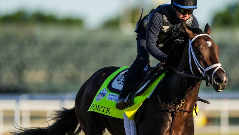 Kentucky Derby contender Forte and exercise rider Hector Ramos work at Churchill Downs Wednesday morning May 3, 2023, in Louisville, Ky. The horse is trained by Todd Pletcher.