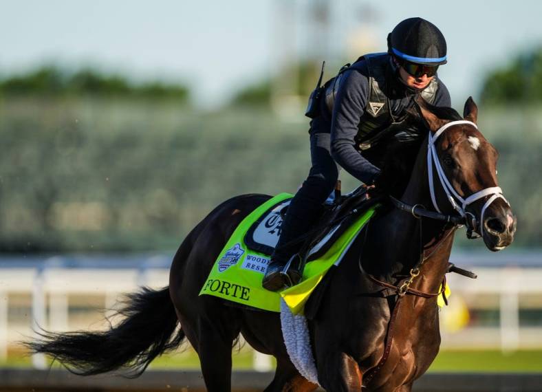 Kentucky Derby contender Forte and exercise rider Hector Ramos work at Churchill Downs Wednesday morning May 3, 2023, in Louisville, Ky. The horse is trained by Todd Pletcher.