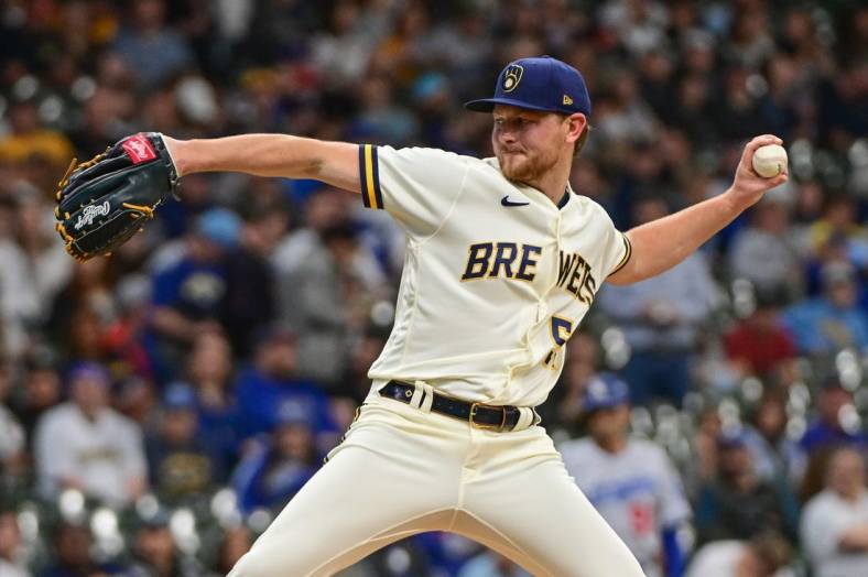 May 9, 2023; Milwaukee, Wisconsin, USA;  Milwaukee Brewers pitcher Eric Lauer (52) pitches against the Los Angeles Dodgers in the first inning at American Family Field. Mandatory Credit: Benny Sieu-USA TODAY Sports