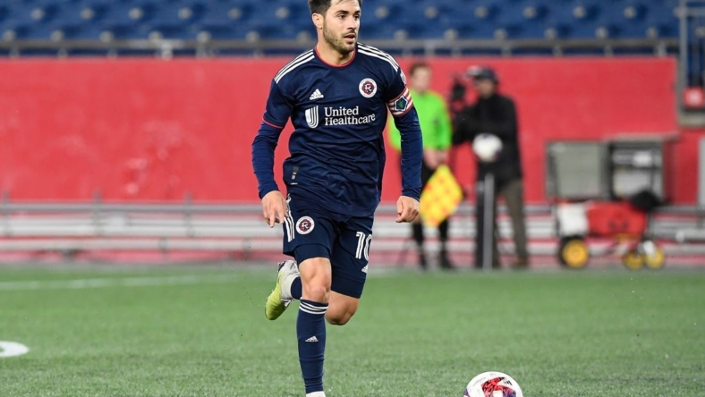 May 9, 2023; Foxborough, MA, USA; New England Revolution midfielder Carles Gil (10) dribbles the ball during the second half at Gillette Stadium. Mandatory Credit: Eric Canha-USA TODAY Sports