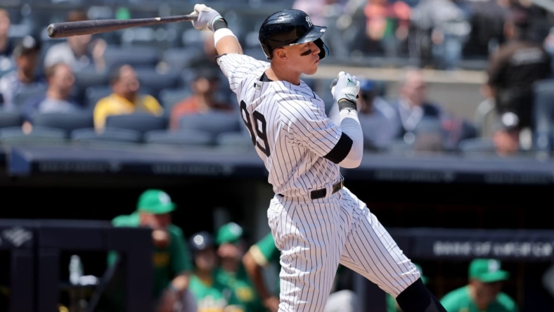 May 10, 2023; Bronx, New York, USA; New York Yankees designated hitter Aaron Judge (99) follows through on a double against the Oakland Athletics during the fifth inning at Yankee Stadium. Mandatory Credit: Brad Penner-USA TODAY Sports