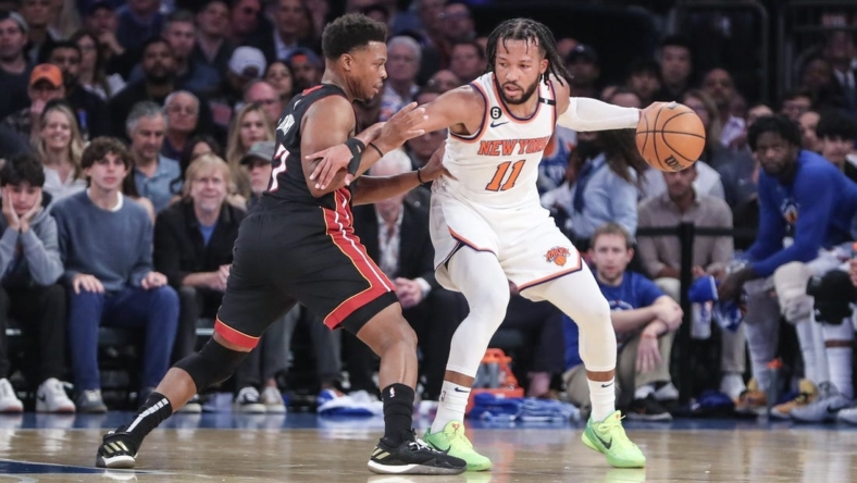 May 10, 2023; New York, New York, USA; New York Knicks guard Jalen Brunson (11) looks to drive past Miami Heat guard Kyle Lowry (7) during game five of the 2023 NBA playoffs at Madison Square Garden. Mandatory Credit: Wendell Cruz-USA TODAY Sports