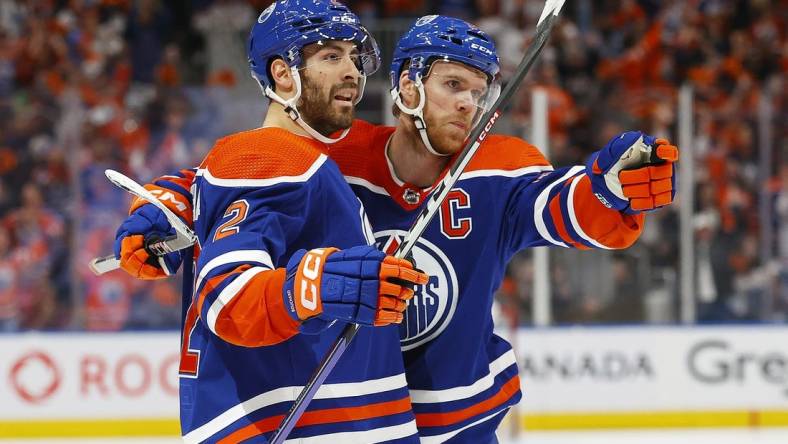 May 10, 2023; Edmonton, Alberta, CAN;The Edmonton Oilers celebrate a goal scored by defensemen Evan Bouchard (2) during the first period against the Vegas Golden Knights in game four of the second round of the 2023 Stanley Cup Playoffs at Rogers Place. Mandatory Credit: Perry Nelson-USA TODAY Sports