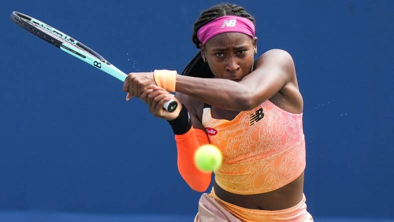 Coco Gauff returns the ball to Marle Bouzkova during their match on the Grand Stand court at the 2022 Western & Southern Open on Tuesday August 16. Gauff forfeit during the second set after receiving an injury.