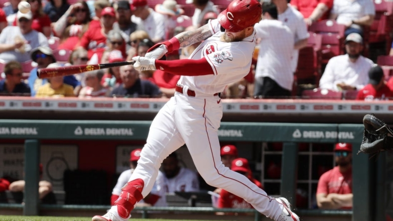 May 11, 2023; Cincinnati, Ohio, USA; Cincinnati Reds left fielder Jake Fraley (27) hits an RBI single against the New York Mets during the first inning at Great American Ball Park. Mandatory Credit: David Kohl-USA TODAY Sports