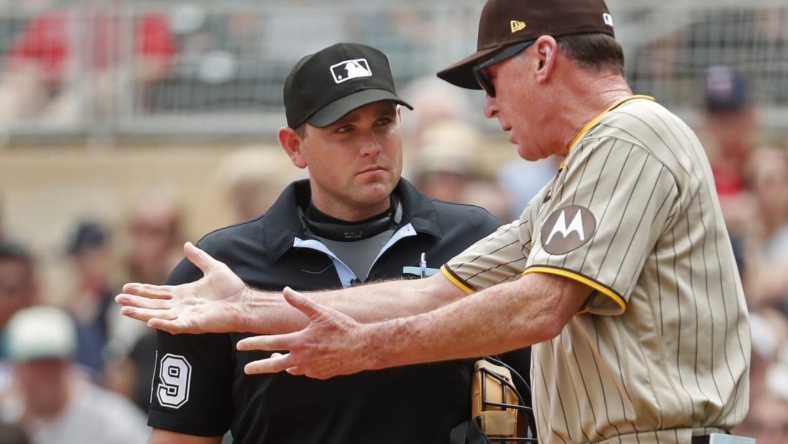 May 11, 2023; Minneapolis, Minnesota, USA; San Diego Padres manager Bob Melvin speaks with home plate umpire Brock Ballou in the eighth inning of the game with the Minnesota Twins at Target Field. Mandatory Credit: Bruce Kluckhohn-USA TODAY Sports