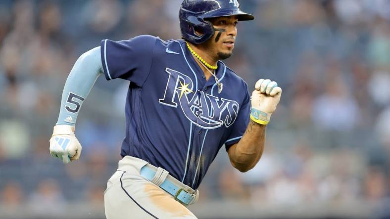 May 11, 2023; Bronx, New York, USA; Tampa Bay Rays shortstop Wander Franco (5) runs to first after hitting a single against the New York Yankees during the third inning at Yankee Stadium. Mandatory Credit: Brad Penner-USA TODAY Sports