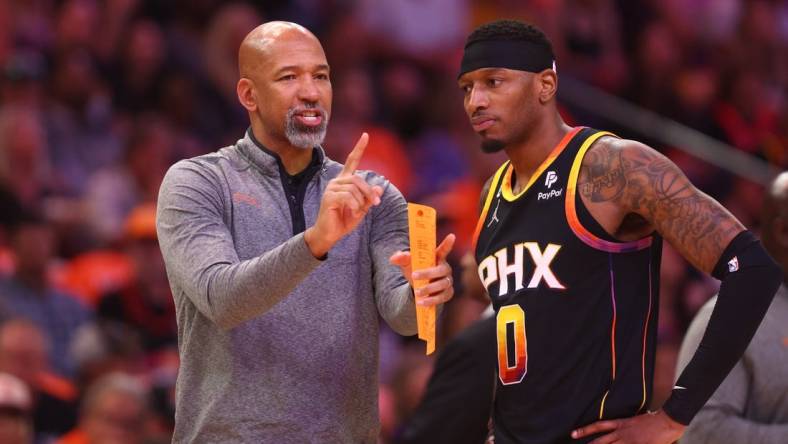 Apr 25, 2023; Phoenix, Arizona, USA; Phoenix Suns head coach Monty Williams with forward Torrey Craig (0) against the Los Angeles Clippers during game five of the 2023 NBA playoffs at Footprint Center. Mandatory Credit: Mark J. Rebilas-USA TODAY Sports