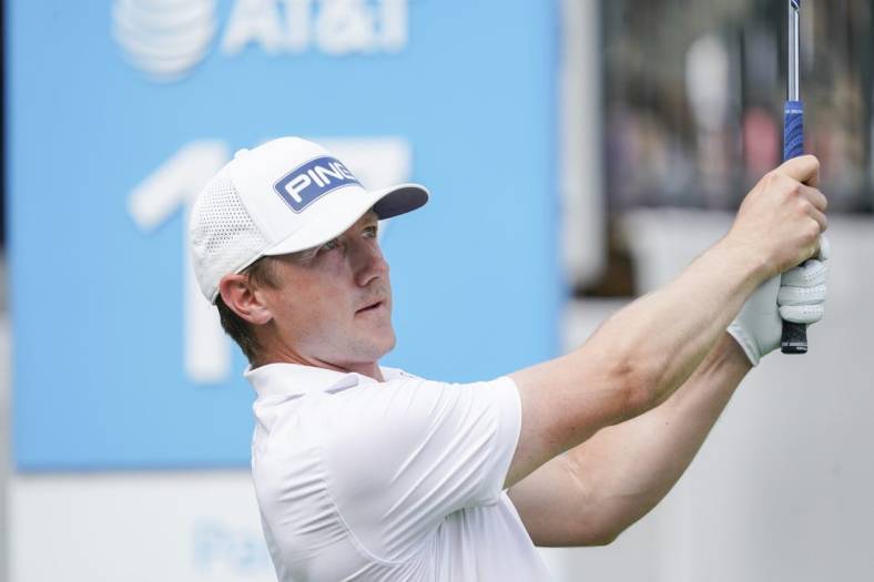 May 12, 2023; McKinney, Texas, USA; Mackenzie Hughes watches his shot from the 17th tee during the second round of the AT&T Byron Nelson golf tournament. Mandatory Credit: Raymond Carlin III-USA TODAY Sports