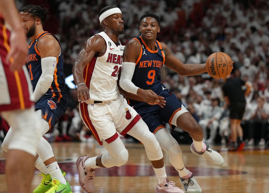 May 12, 2023; Miami, Florida, USA; New York Knicks guard RJ Barrett (9) drives around Miami Heat forward Jimmy Butler (22) in the first half during game six of the 2023 NBA playoffs at Kaseya Center. Mandatory Credit: Jim Rassol-USA TODAY Sports