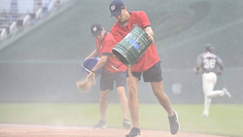 May 13, 2023; Washington, District of Columbia, USA; Washington Nationals grounds crew speeds field conditioner before the third inning of the game between the Washington Nationals and the New York Mets at Nationals Park. Mandatory Credit: Brad Mills-USA TODAY Sports