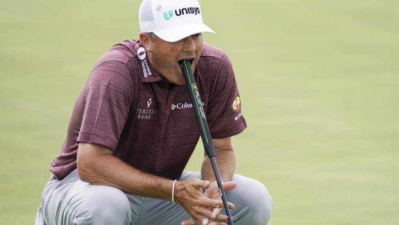 May 13, 2023; McKinney, Texas, USA; Ryan Palmer reacts after missing an eagle putt on the 18th green during the third round of the AT&T Byron Nelson golf tournament. Mandatory Credit: Raymond Carlin III-USA TODAY Sports