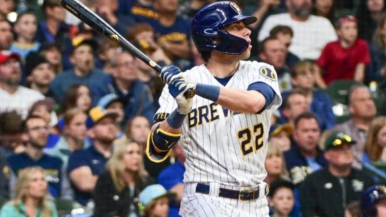 May 13, 2023; Milwaukee, Wisconsin, USA; Milwaukee Brewers left fielder Christian Yelich (22) hits a 2-run home run in the third inning against the Kansas City Royals at American Family Field. Mandatory Credit: Benny Sieu-USA TODAY Sports