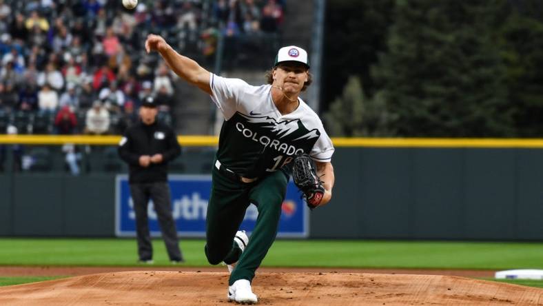 May 13, 2023; Denver, Colorado, USA; Colorado Rockies starting pitcher Ryan Feltner (18) delivers a pitch in the first inning against the Philadelphia Phillies at Coors Field. Mandatory Credit: John Leyba-USA TODAY Sports