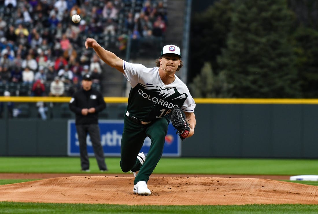 May 13, 2023; Denver, Colorado, USA; Colorado Rockies starting pitcher Ryan Feltner (18) delivers a pitch in the first inning against the Philadelphia Phillies at Coors Field. Mandatory Credit: John Leyba-USA TODAY Sports