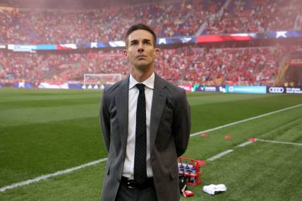 May 13, 2023; Harrison, New Jersey, USA; New York Red Bulls head coach Troy Lesesne stands for the national anthem before a game against New York City FC at Red Bull Arena. Mandatory Credit: Brad Penner-USA TODAY Sports