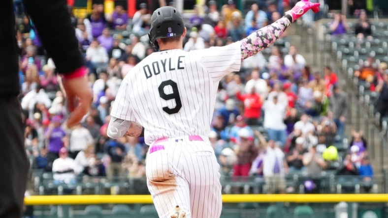 May 14, 2023; Denver, Colorado, USA; Colorado Rockies center fielder Brenton Doyle (9) runs off his solo home run in the fifth inning against the Philadelphia Phillies at Coors Field. Mandatory Credit: Ron Chenoy-USA TODAY Sports