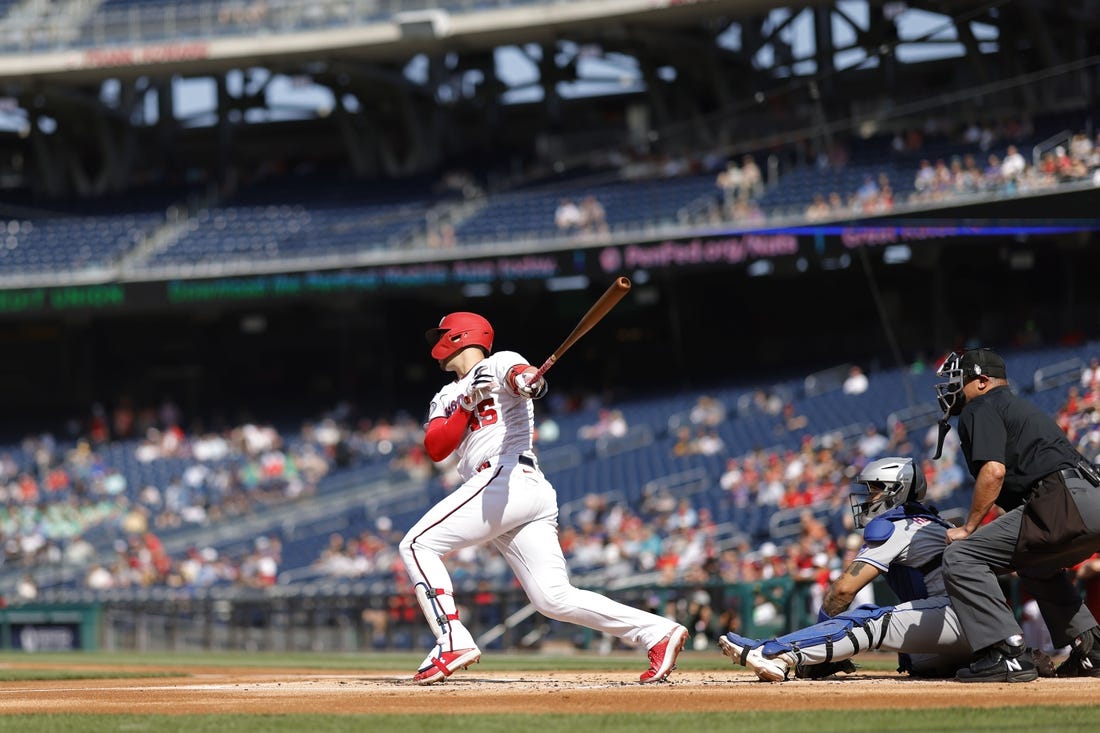 May 15, 2023; Washington, District of Columbia, USA; Washington Nationals designated hitter Joey Meneses (45) hits an RBI double against the New York Mets during the first inning at Nationals Park. Mandatory Credit: Geoff Burke-USA TODAY Sports