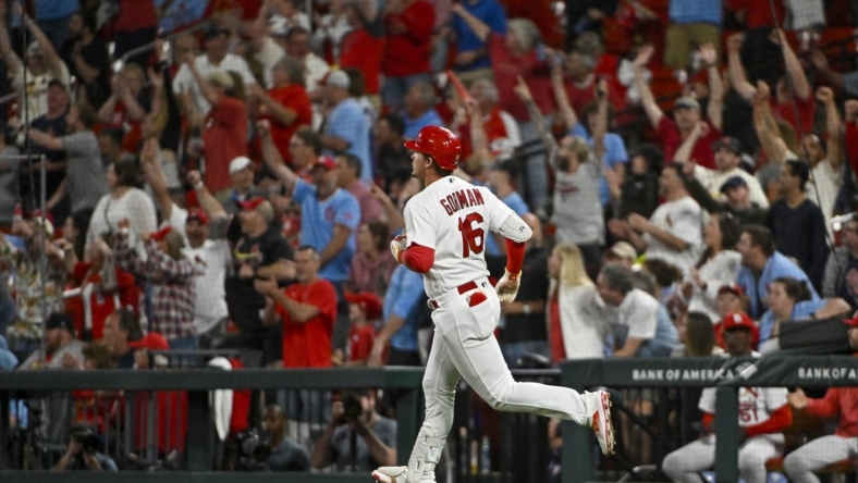 May 15, 2023; St. Louis, Missouri, USA;  St. Louis Cardinals designated hitter Nolan Gorman (16) hits a three run home run against the Milwaukee Brewers during the eighth inning at Busch Stadium. Mandatory Credit: Jeff Curry-USA TODAY Sports