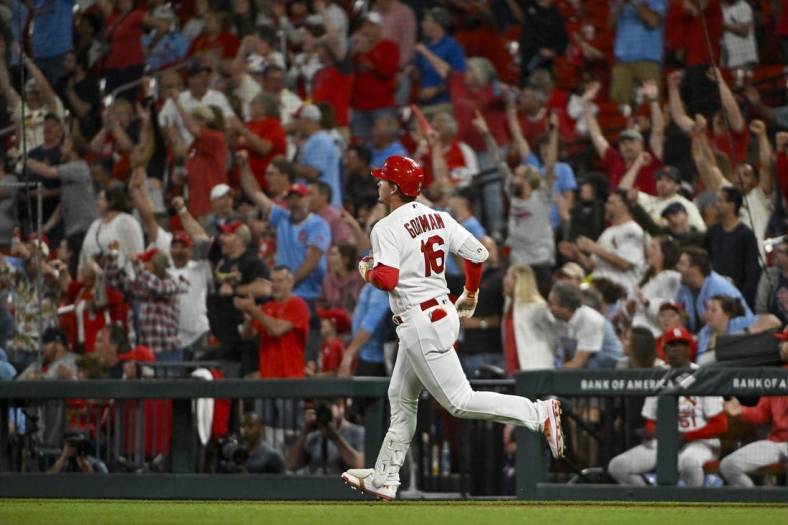 May 15, 2023; St. Louis, Missouri, USA;  St. Louis Cardinals designated hitter Nolan Gorman (16) hits a three run home run against the Milwaukee Brewers during the eighth inning at Busch Stadium. Mandatory Credit: Jeff Curry-USA TODAY Sports