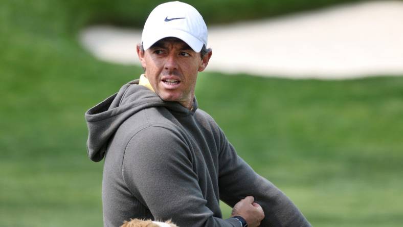 Rory McIlroy warms up in the practice range before a practice round at the PGA Championship.