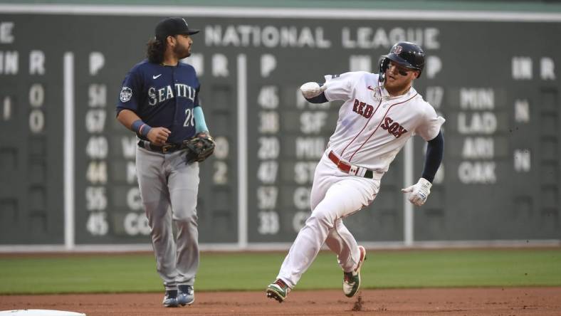 May 16, 2023; Boston, Massachusetts, USA; Boston Red Sox right fielder Alex Verdugo (99) rounds third base during the first inning against the Seattle Mariners at Fenway Park. Mandatory Credit: Bob DeChiara-USA TODAY Sports