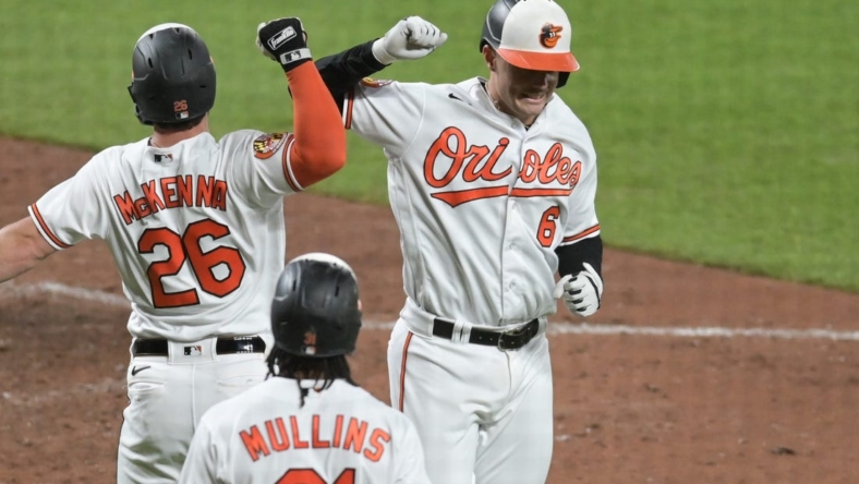 May 16, 2023; Baltimore, Maryland, USA;  Baltimore Orioles first baseman Ryan Mountcastle (6) celebrates with left fielder Ryan McKenna (26) after hitting a two run home run against the Los Angeles Angels at Oriole Park at Camden Yards. Mandatory Credit: Tommy Gilligan-USA TODAY Sports
