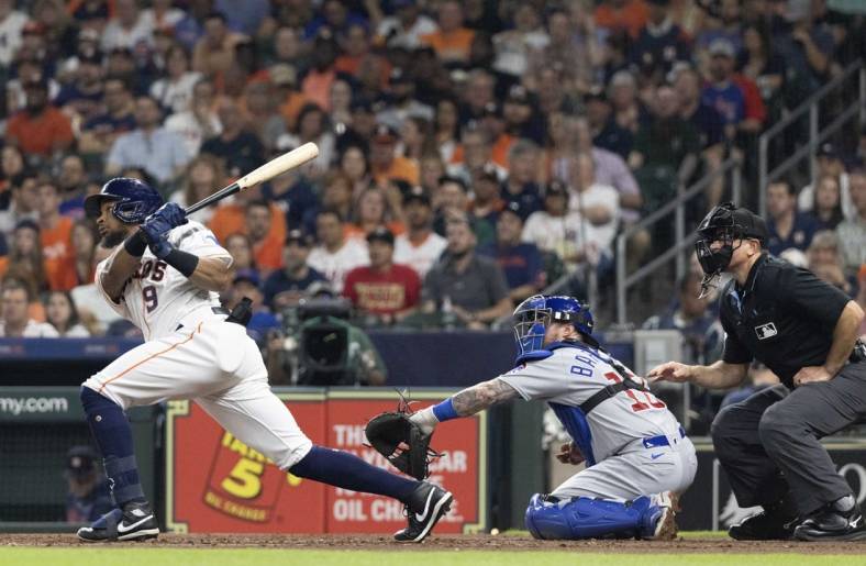 Yordan Alvarez of the Houston Astros doubles in the fourth inning